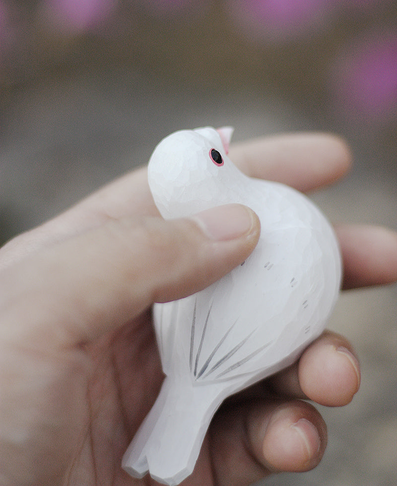 Figurine di coppia di piccioni