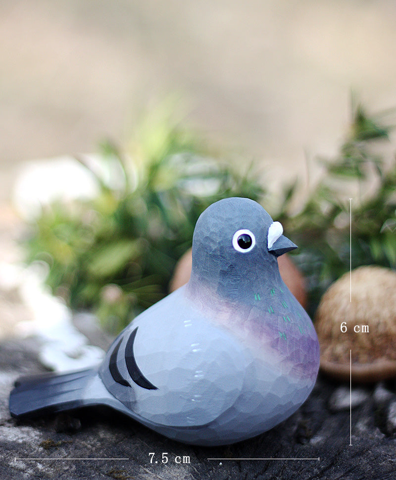 Figurines de couples de pigeons