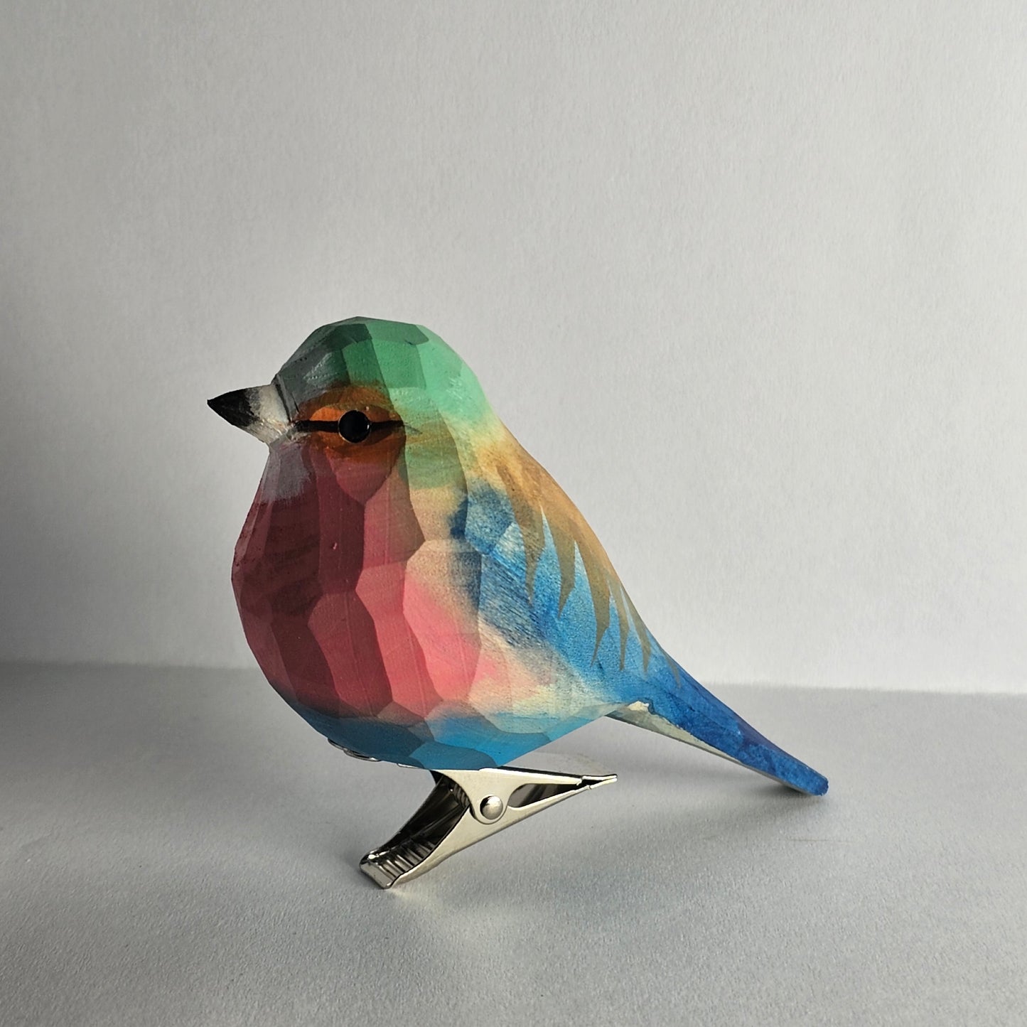 Clip-on vogelornament met lila borst