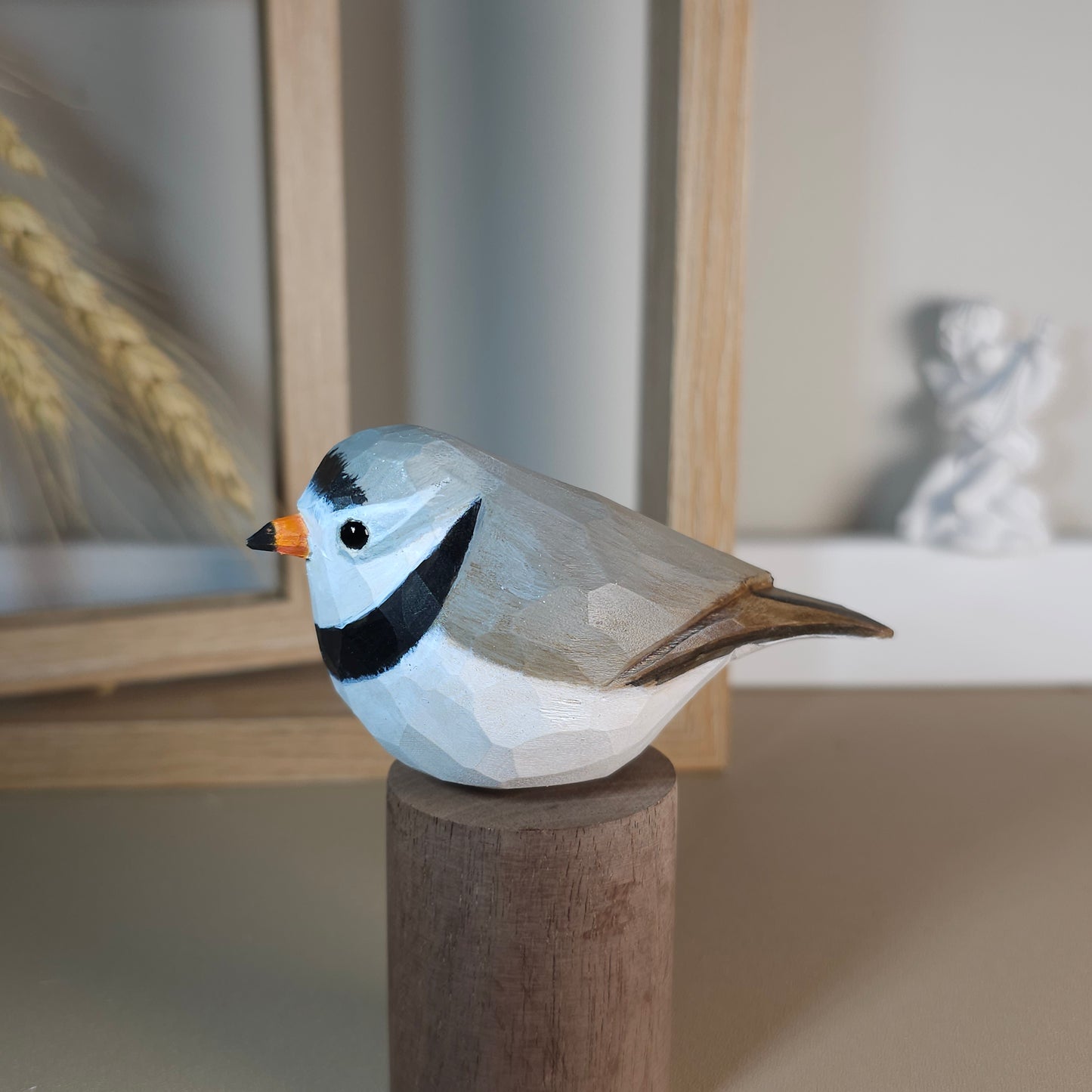 Figurines d’oiseaux pluvier siffleur