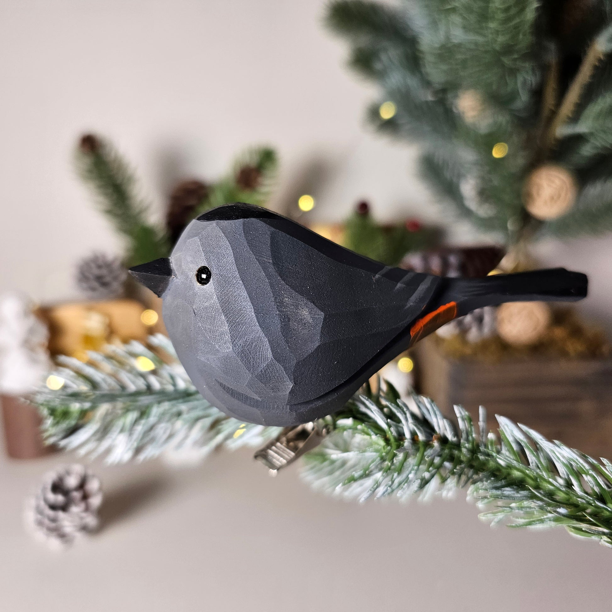 Hand-carved solid basswood Gray Catbird clip-on ornament showing slate-grey plumage, black cap, and elegant profile — by Painted Bird Shop.