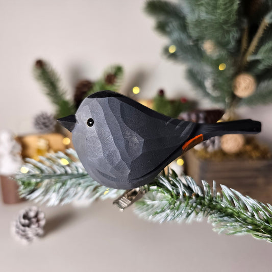 Hand-carved solid basswood Gray Catbird clip-on ornament showing slate-grey plumage, black cap, and elegant profile — by Painted Bird Shop.