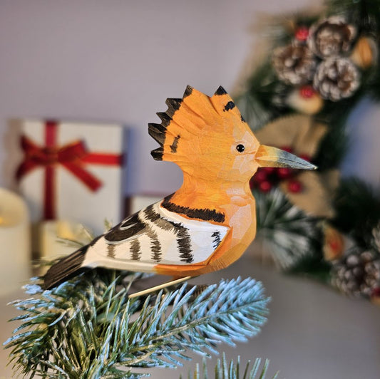 Hand-carved solid basswood Hoopoe bird clip-on ornament showing cinnamon plumage, black-and-white barred wings, and signature crown crest — by Painted Bird Shop.