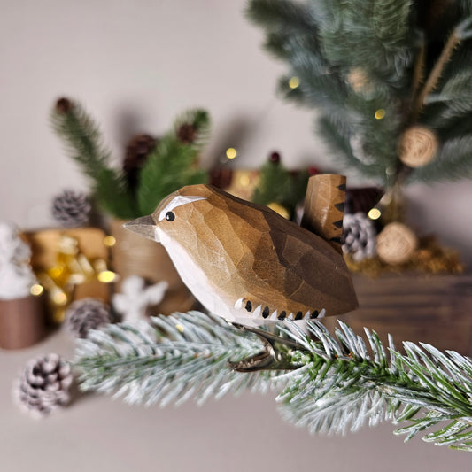 Hand-carved solid basswood Winter Wren clip-on ornament showing rich rufous-brown plumage, barred flanks, and upright cocked tail — by Painted Bird Shop.